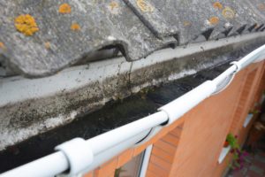 Hillsboro dirty gutter needing cleaning